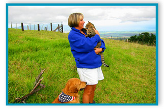 Katrina Pitman in Field with her Pets